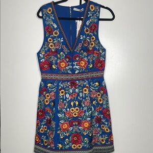 Size 8 Alice+Olivia midi blue with floral pattern.